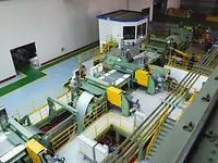 PPL exit section with looper, side trimmer, and inspection table