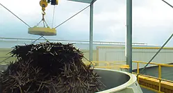 Steel scrap is fed to the leaching column