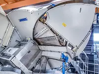 HHQ-Chipper with the chipper hood open, showing the chipper disc and knives.