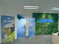 PT ANDRITZ office lobby, with several ANDRITZ rollups on display