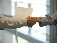 ANDRITZ Sovema - shaking hand after a supply shain contract